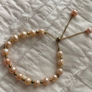 Peach colored pearl like bracelet- adjustable